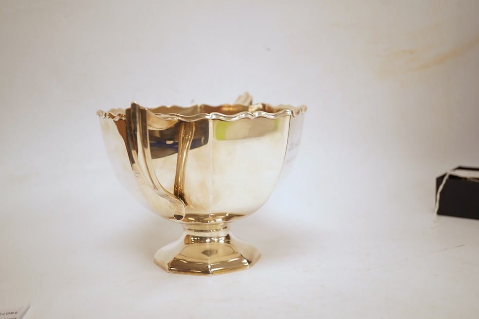 An Edwardian silver two handled pedestal presentation bowl, by Horace Woodward & Co, London, 1980, with later engraved inscription, height 12.7cm, 15.9oz.